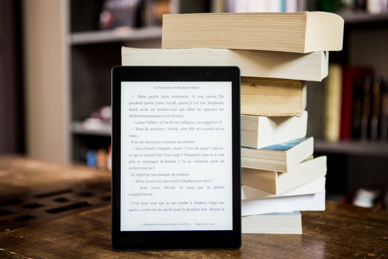 Pile of books and a tablet